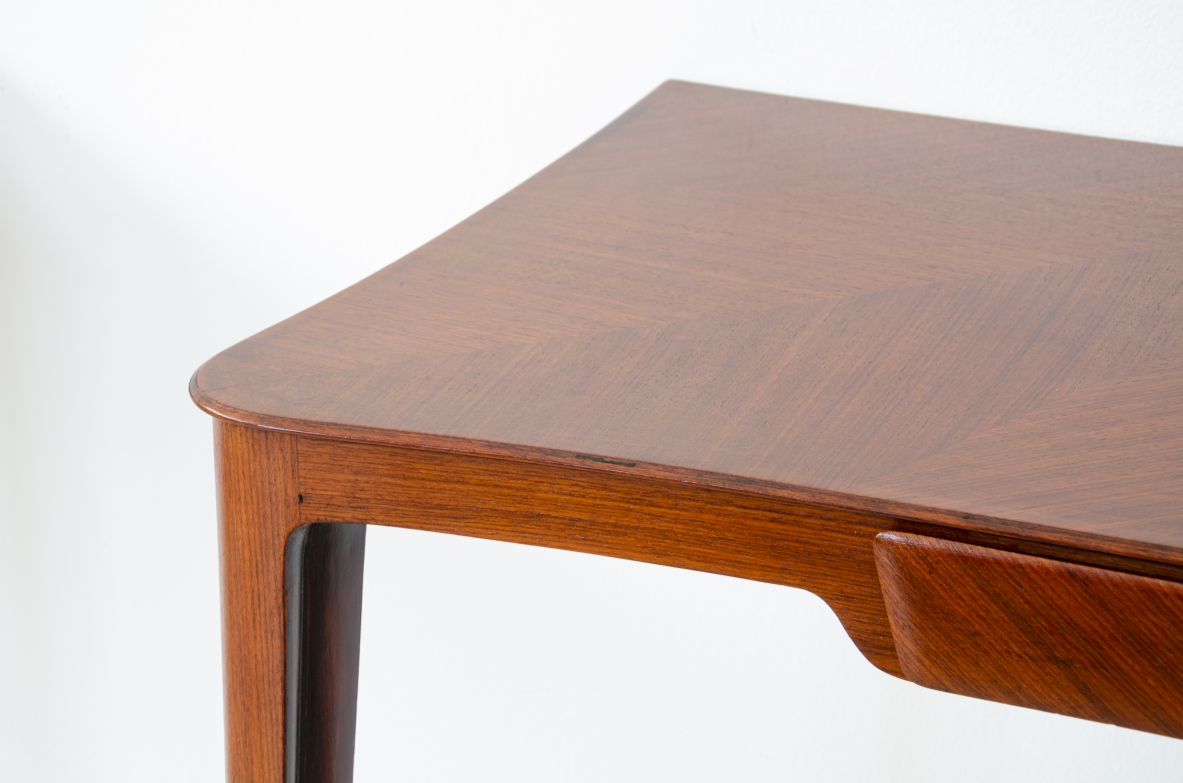 Elegant pair of wooden consoles with exotic wood veneer top and shaped drawer on the front.  Attr. Carlo Rava, 1950s.