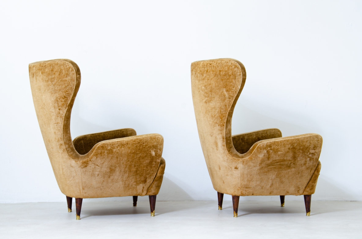 Pair of elegant organic armchairs with high back. Italian manufacture, 1950's.