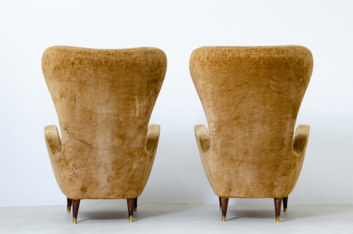 Pair of elegant organic armchairs with high back. Italian manufacture, 1950's.