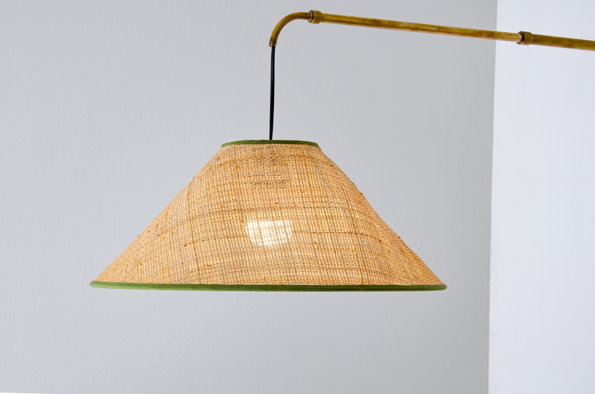 Telescopic brass lamp with woven straw shade and counterweight. Italian manufacture 1930/1950.