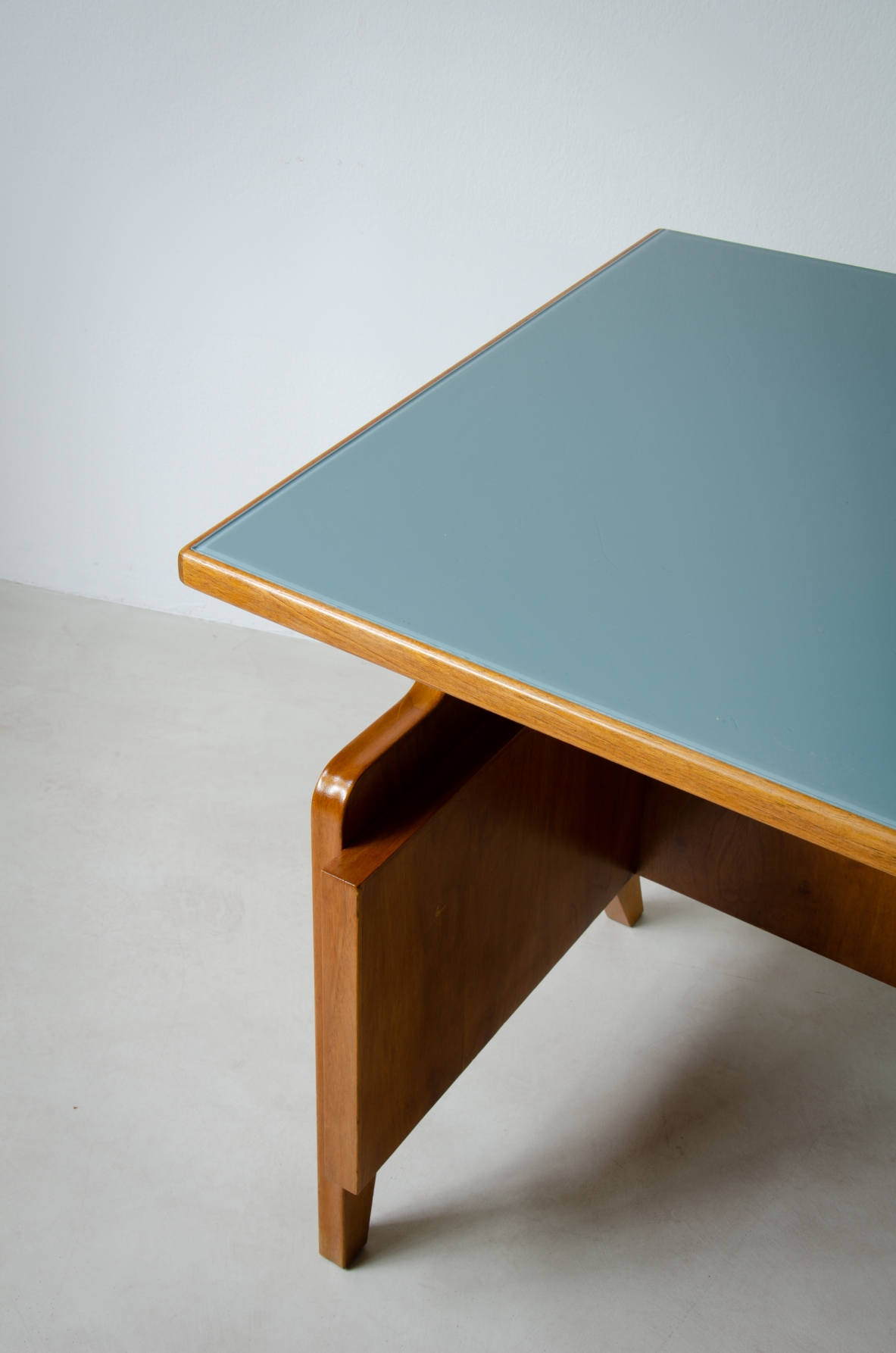Oak desk with ribbed wood structure and green opaline glass top. Turin school, Italy, 1950's