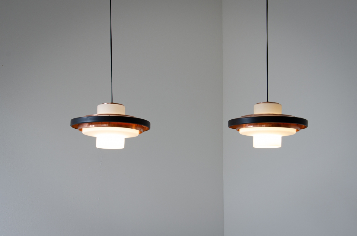 Rare pair of opaline glass chandeliers and copper disc. Stilnovo, 1960's.