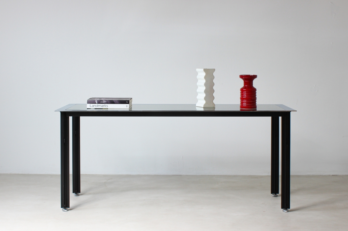 Luigi Caccia Domignoni Console con piano in vetro con fascia in metallo cromato. Produzione Azucena, 1970ca