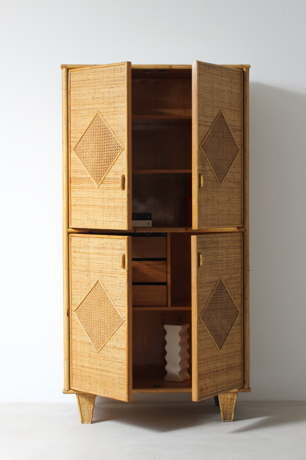 Wardrobe in ash wood, covering in raffia and rattan. Vivai del Sud, 1960's.
