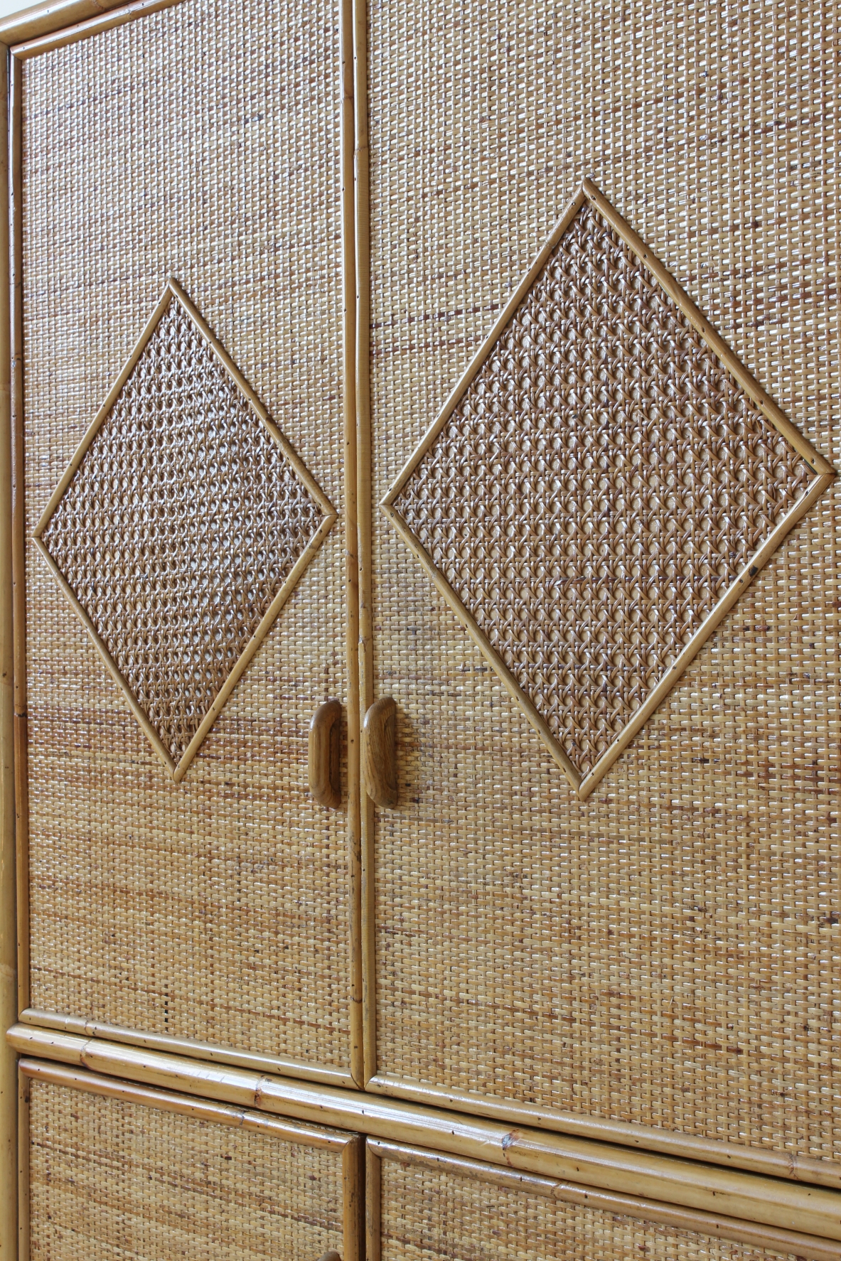 Wardrobe in ash wood, covering in raffia and rattan. Vivai del Sud, 1960's.