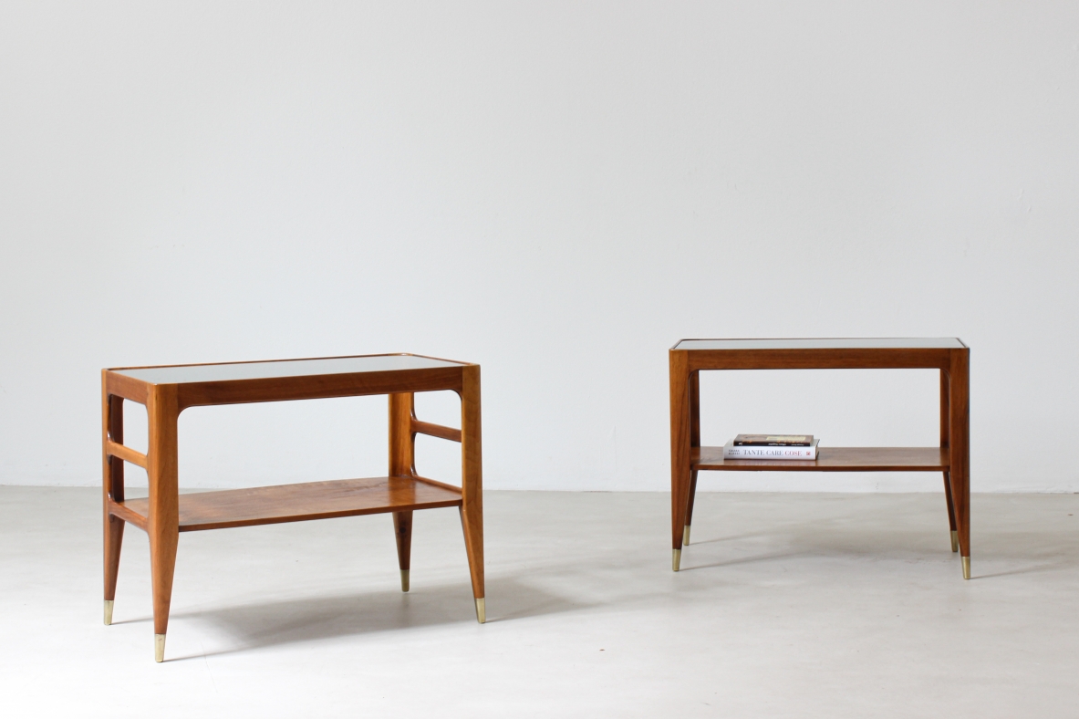 Unique pair of center tables in walnut with crystal glass top and sides openings, nice brass tips.  Attributed to Gio Ponti 1950's
