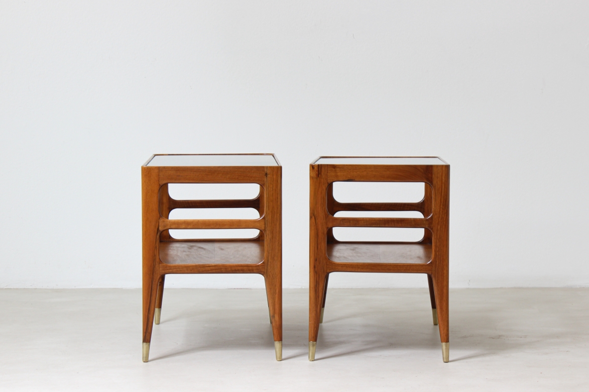 Unique pair of center tables in walnut with crystal glass top and sides openings, nice brass tips.  Attributed to Gio Ponti 1950's
