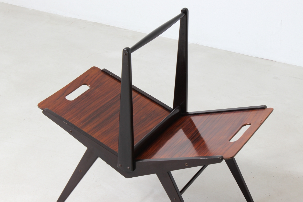 Elegante portariviste in legno scuro  Manifattura italiana, 1950ca.