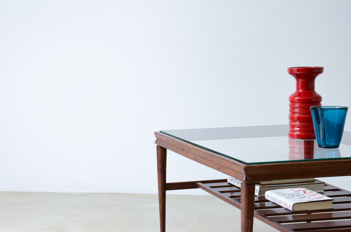 Elegant low table in polished wood with ground glass top and slatted shelf.  Italian manufacture, around 1950.