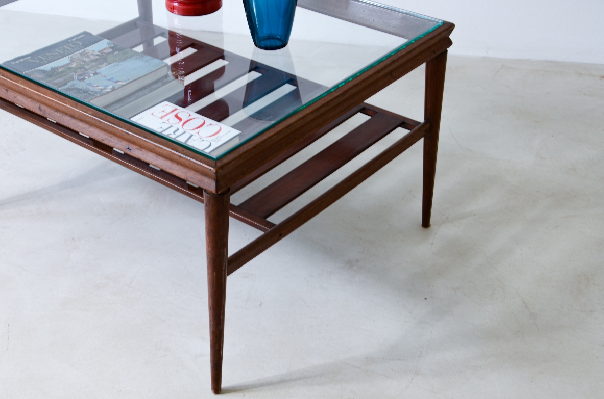 Elegant low table in polished wood with ground glass top and slatted shelf.  Italian manufacture, around 1950.