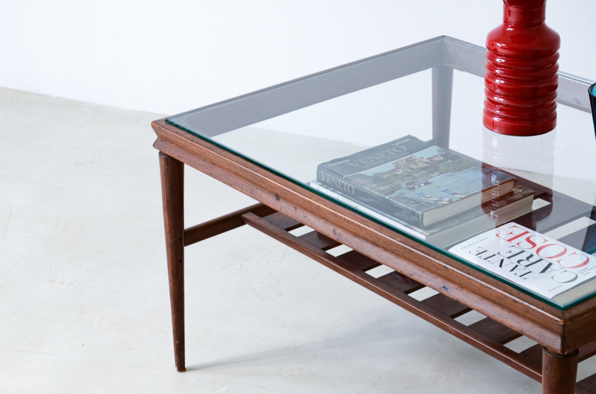 Elegant low table in polished wood with ground glass top and slatted shelf.  Italian manufacture, around 1950.