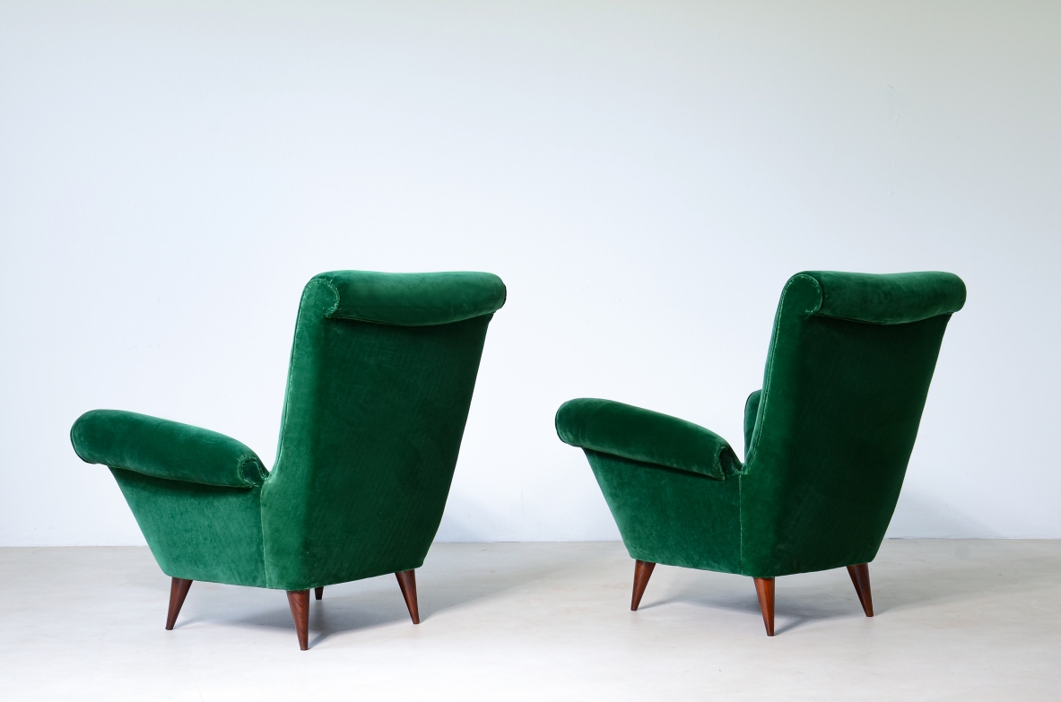 Pair of elegant upholstered velvet high back armchairs.  Italian manufacture around 1950.