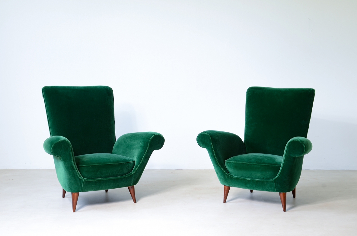 Pair of elegant upholstered velvet high back armchairs.  Italian manufacture around 1950.