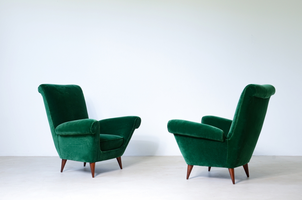 Pair of elegant upholstered velvet high back armchairs.  Italian manufacture around 1950.