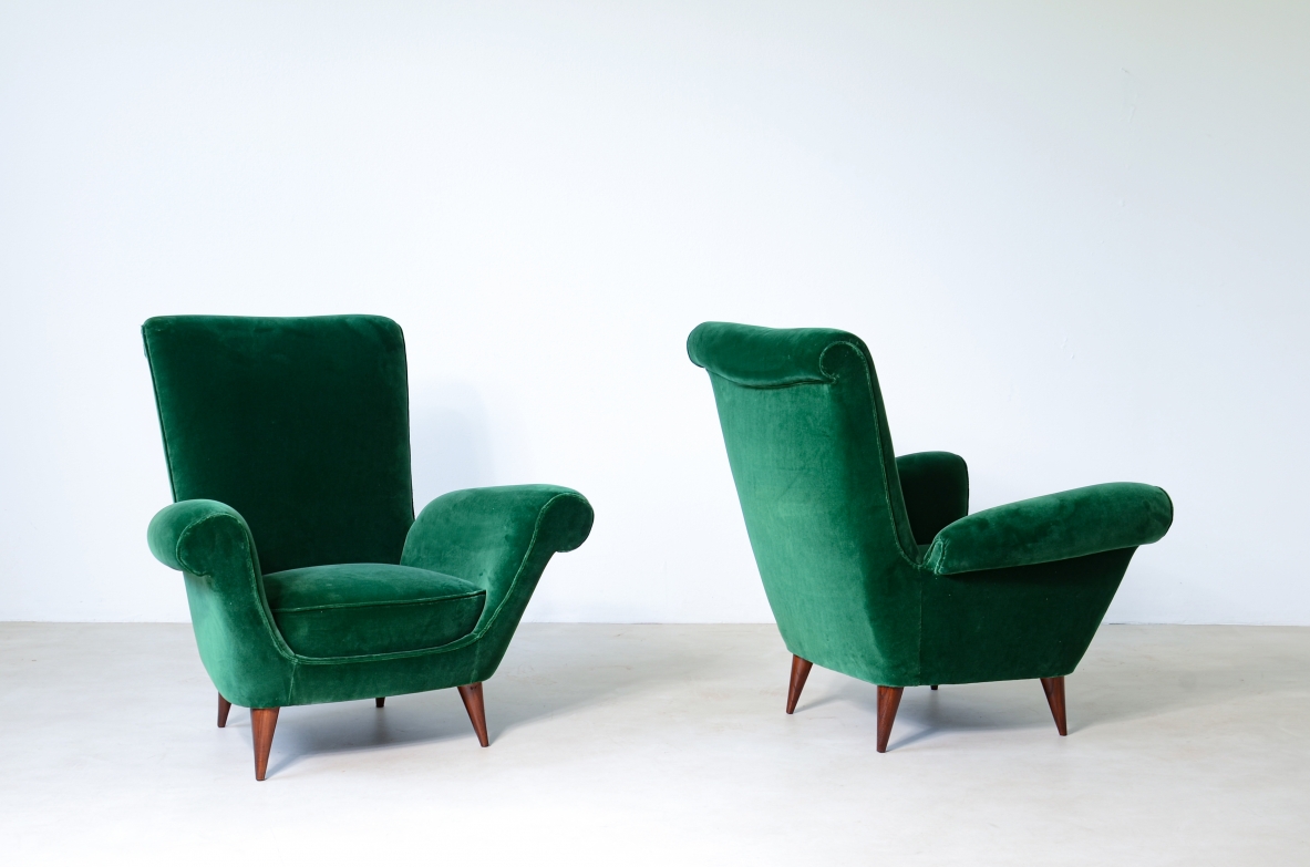 Pair of elegant upholstered velvet high back armchairs.  Italian manufacture around 1950.