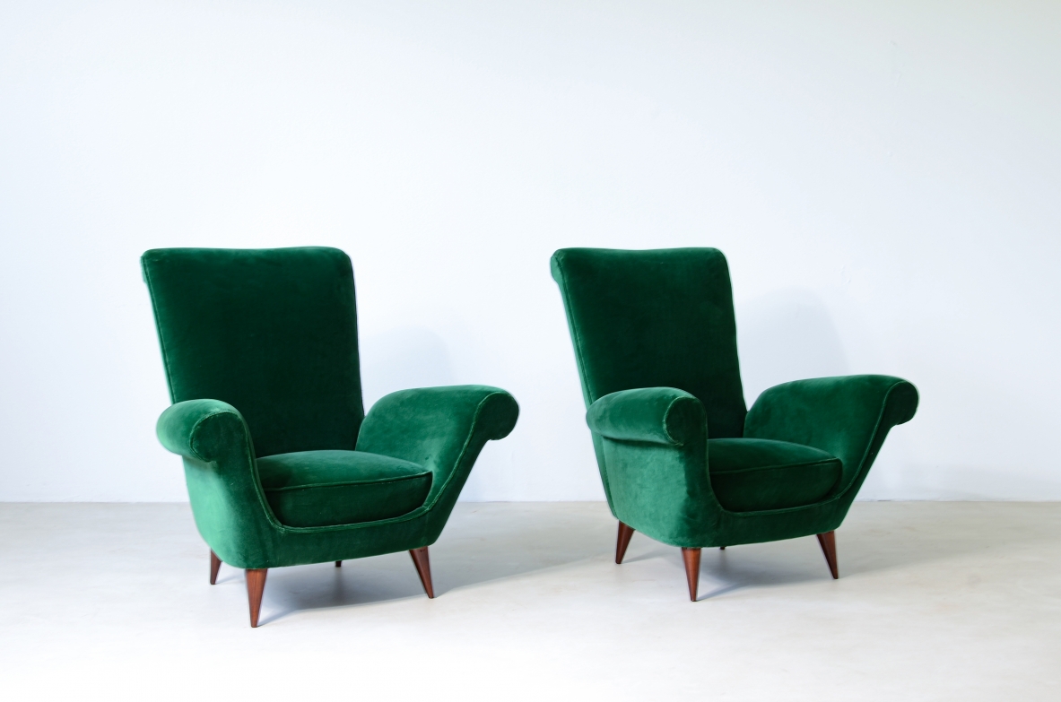 Pair of elegant upholstered velvet high back armchairs.  Italian manufacture around 1950.