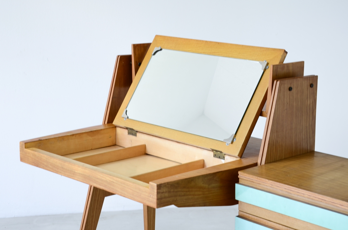 Ico Parisi (1916-1996)  Bedroom writing desk in oak with compartment for objects and shelf. Two drawers on the right side. Top and drawers with original period polypropyleneapplications.  Italian manufacture, 1955. ( to be restored)