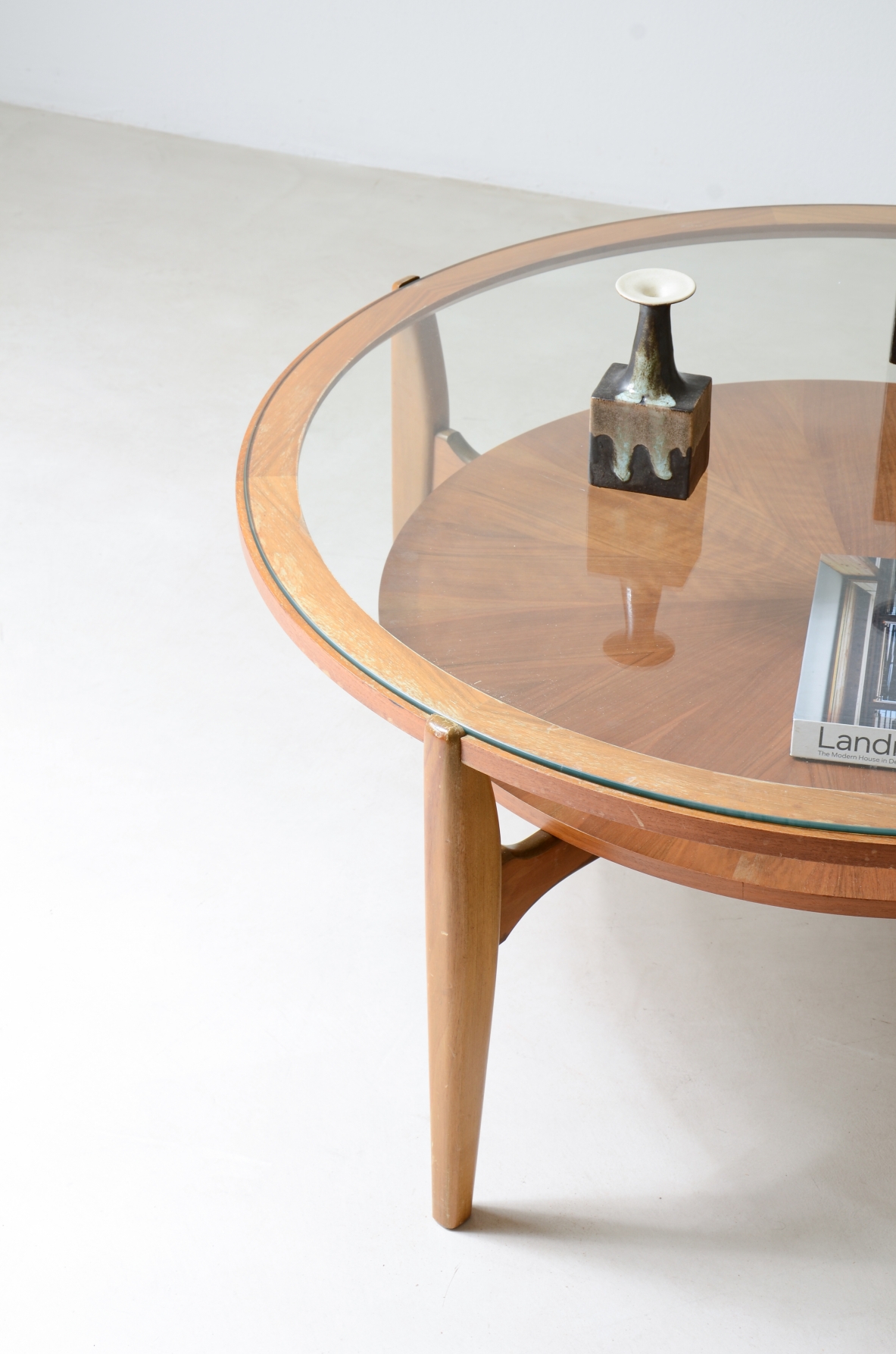 Large low table in light wood with ground glass top and wooden top.  Italian manufacture, around 1950.