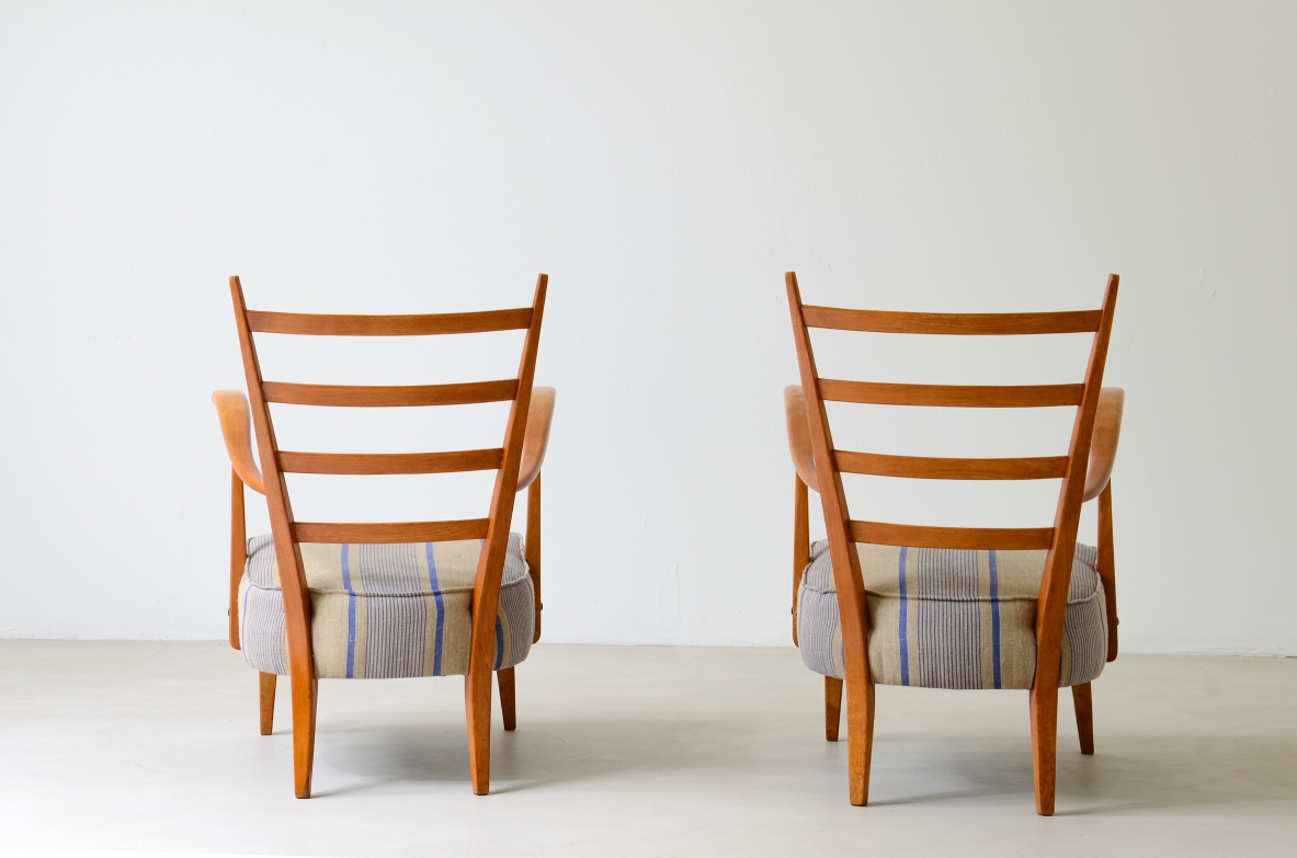 Guglielmo Pecorini. Pair of shaped cherry wood armchairs with padded seat and back cushion. 1950s manufacture.