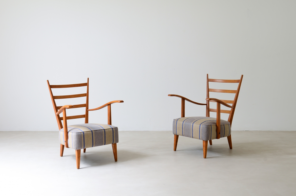 Guglielmo Pecorini. Pair of shaped cherry wood armchairs with padded seat and back cushion. 1950s manufacture.