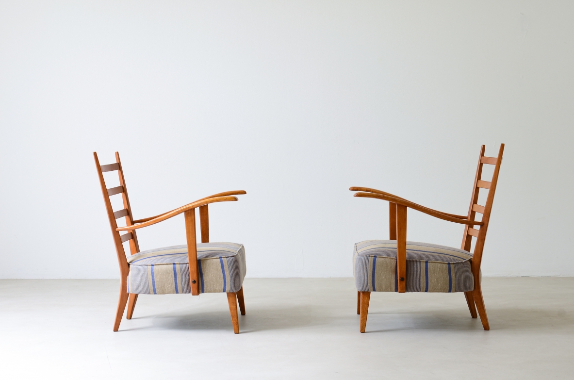 Guglielmo Pecorini. Pair of shaped cherry wood armchairs with padded seat and back cushion. 1950s manufacture.