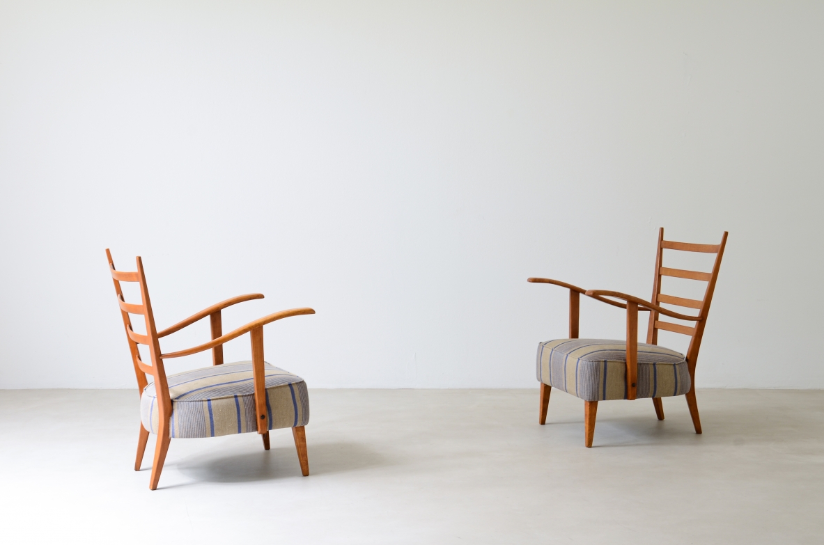 Guglielmo Pecorini. Pair of shaped cherry wood armchairs with padded seat and back cushion. 1950s manufacture.