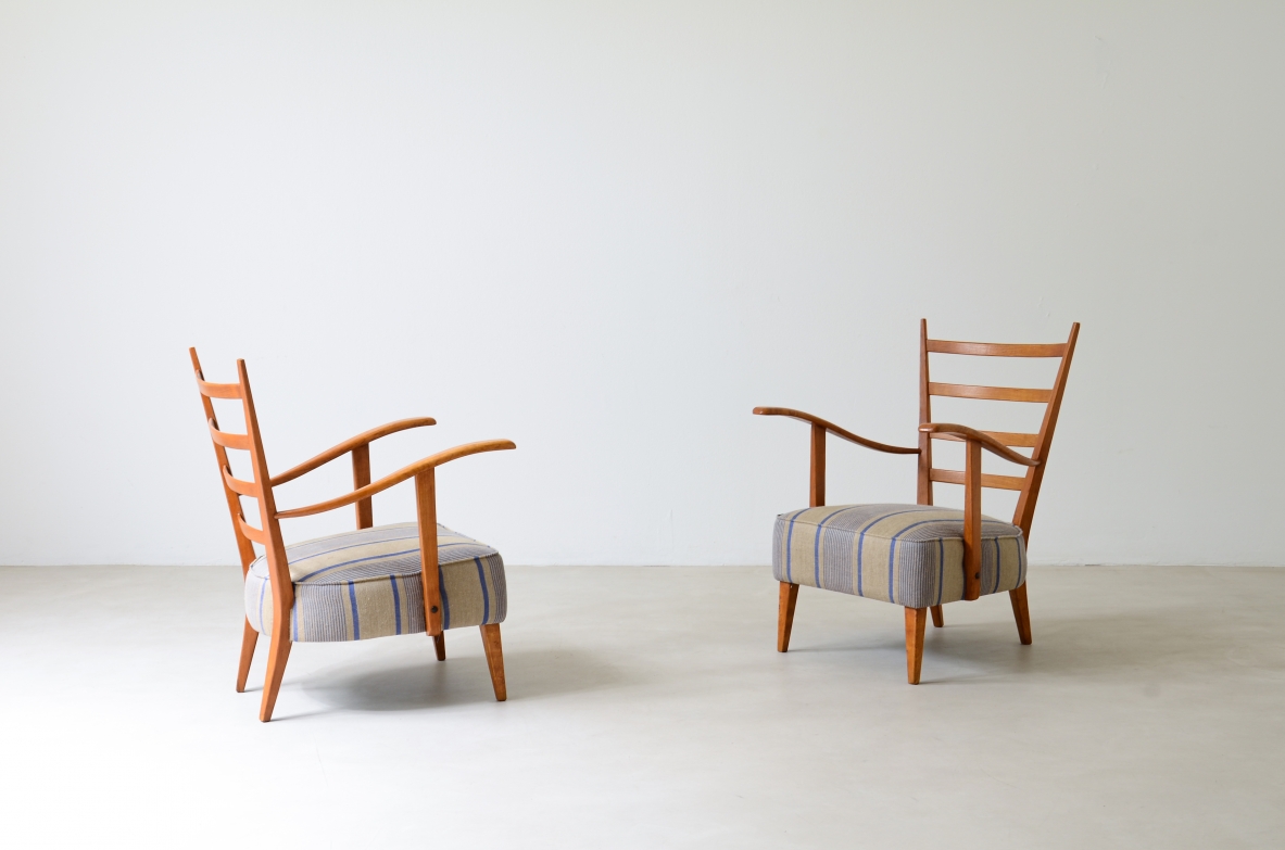 Guglielmo Pecorini. Pair of shaped cherry wood armchairs with padded seat and back cushion. 1950s manufacture.