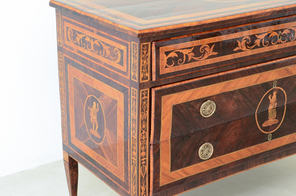 Furniture inlaid with precious woods. Three drawers with brass handles and vents.  Italian manufacture, Lombardy, Louis XVI era, around 1780