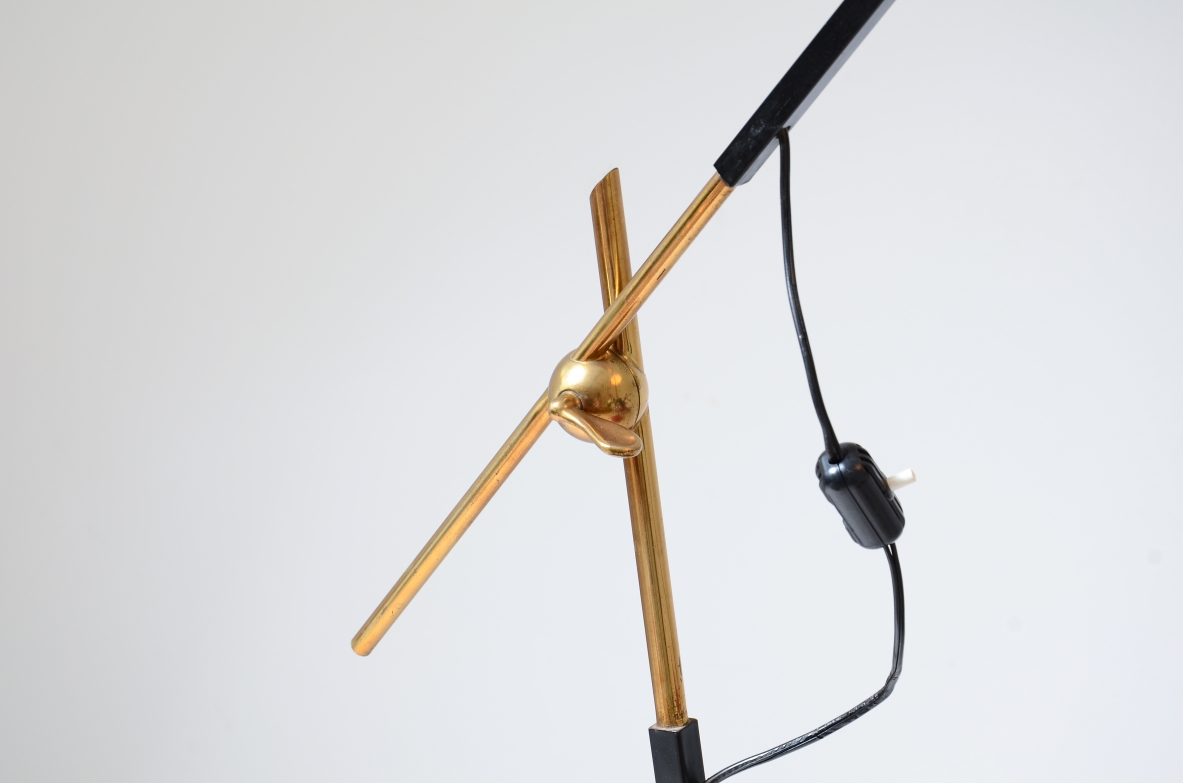 Angelo Ostuni  Elegant floor lamp with adjustable arm, metal and glass hat and diamond cut marble base.  Oluce Milano, Italian manufacture 1950's.