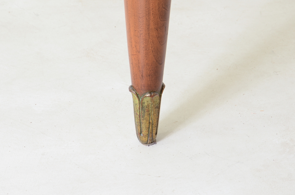 Elegant table with band motif in grissinato wood, top in walnut wood, turned legs with carved wooden tips.  Italian manufacture approx. 1940's.