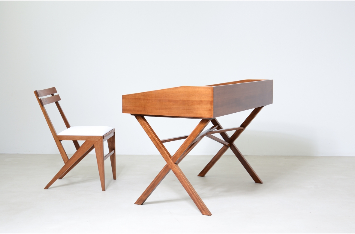 Center desk in walnut with beautiful cross on the base and little houses on the top.  Italian manufacture, 1960's