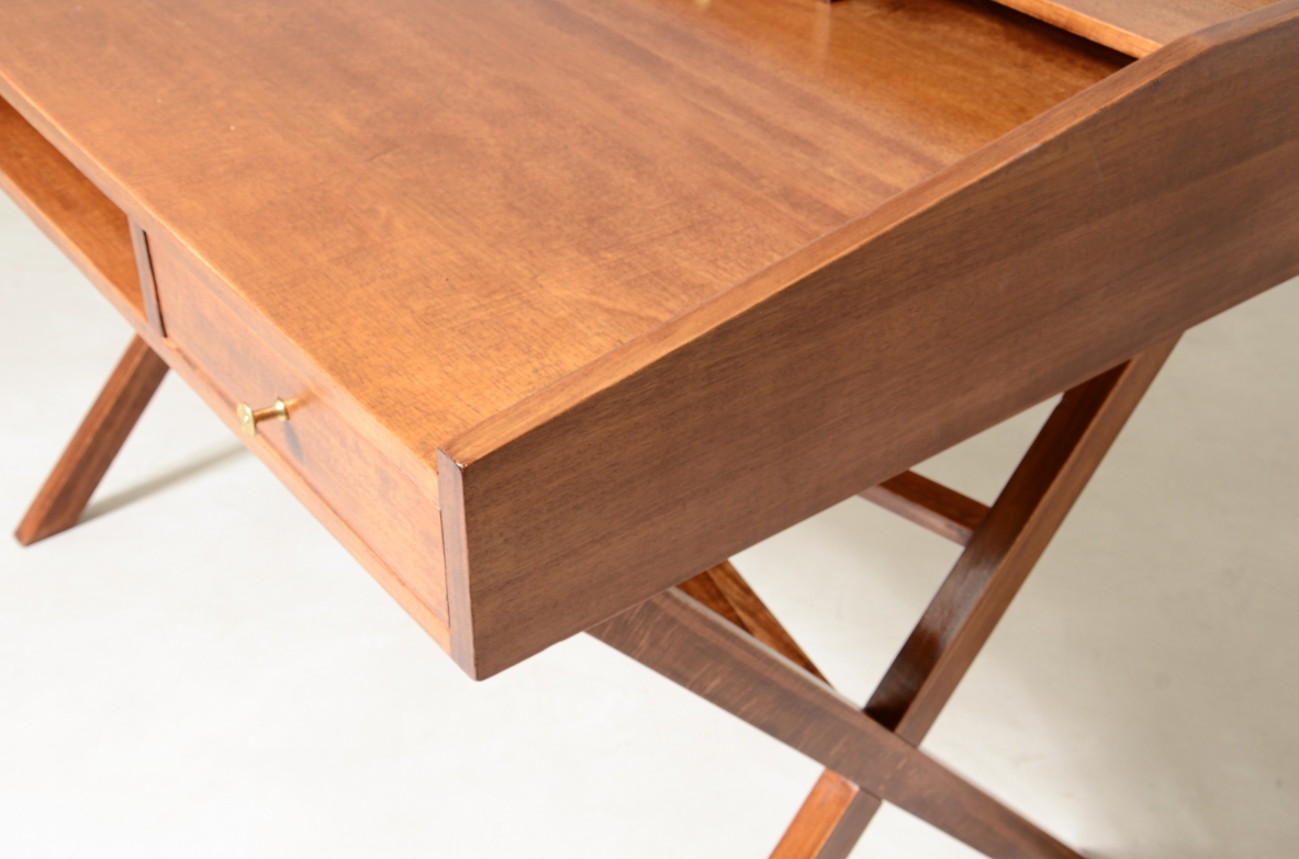 Center desk in walnut with beautiful cross on the base and little houses on the top.  Italian manufacture, 1960's