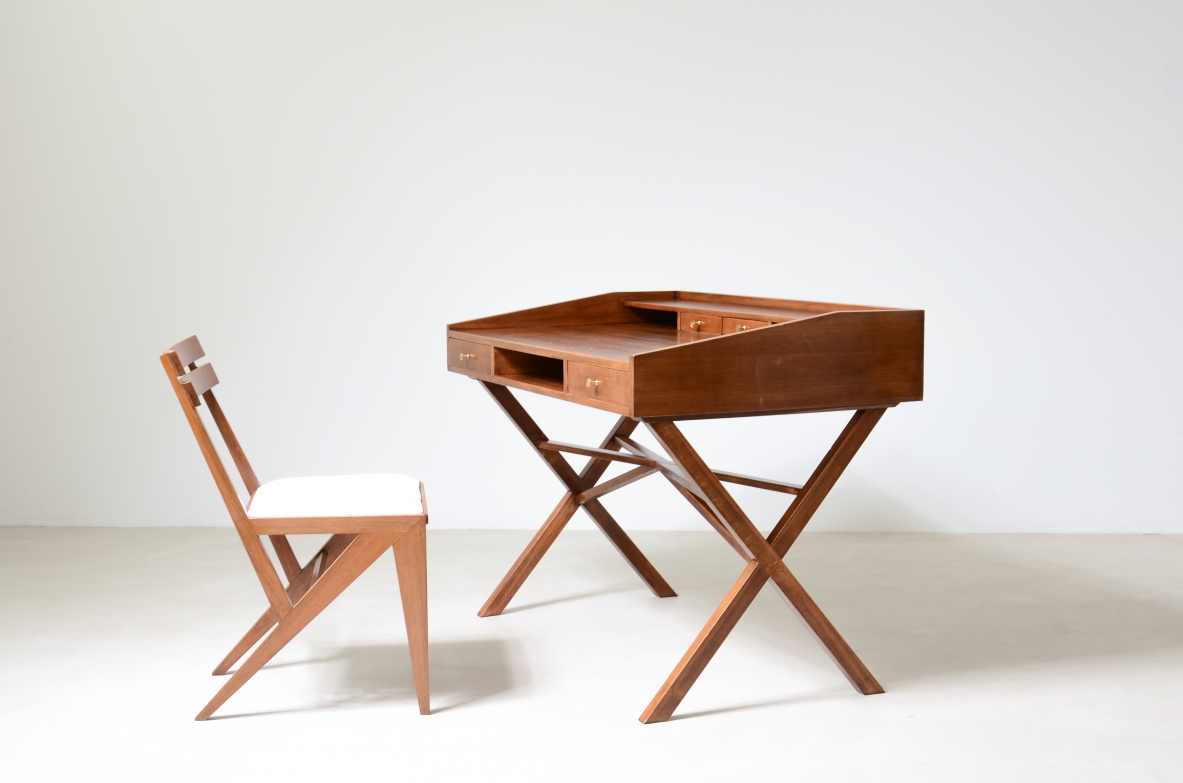 Center desk in walnut with beautiful cross on the base and little houses on the top.  Italian manufacture, 1960's