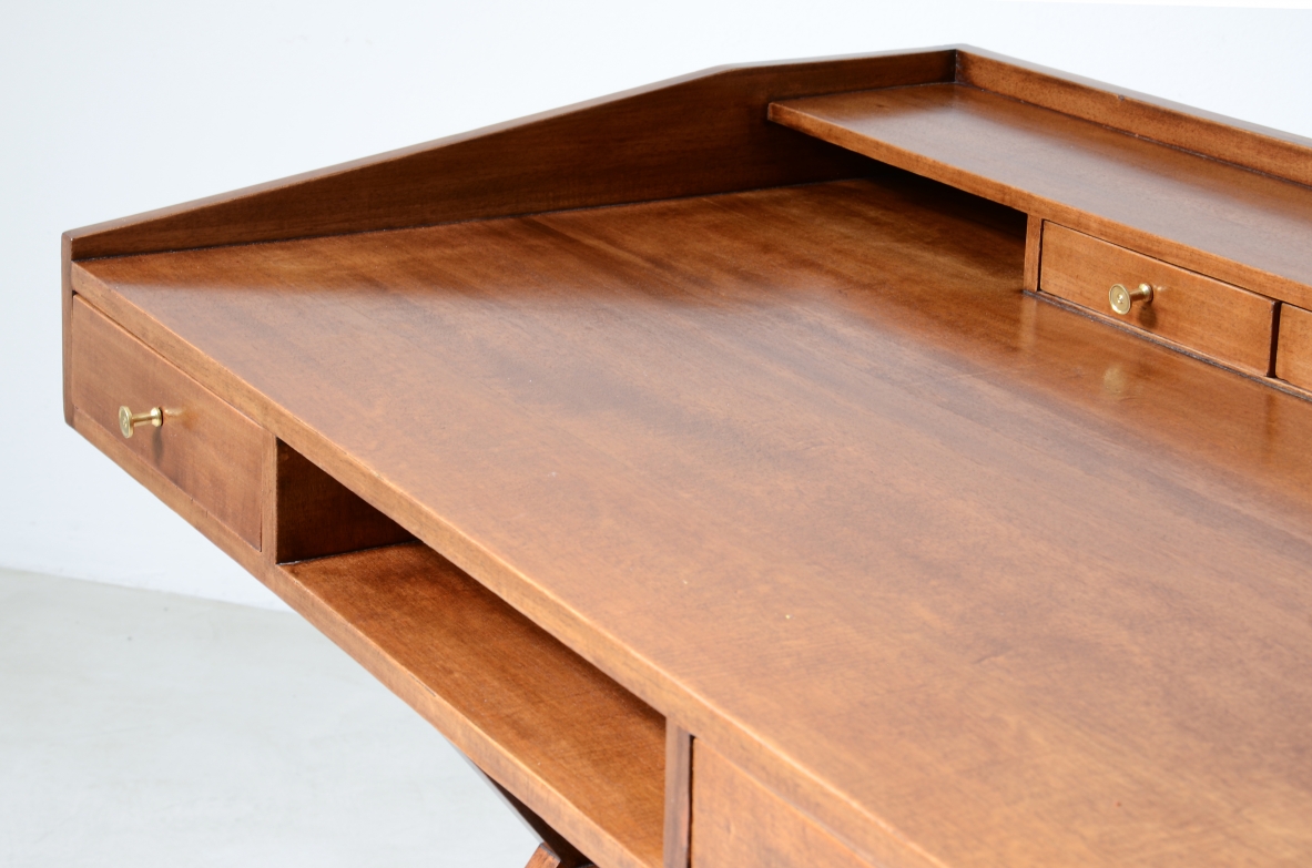 Center desk in walnut with beautiful cross on the base and little houses on the top.  Italian manufacture, 1960's