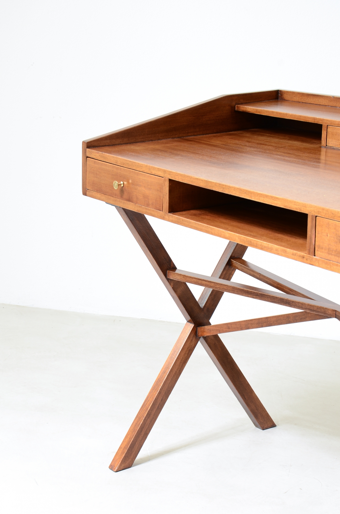 Center desk in walnut with beautiful cross on the base and little houses on the top.  Italian manufacture, 1960's
