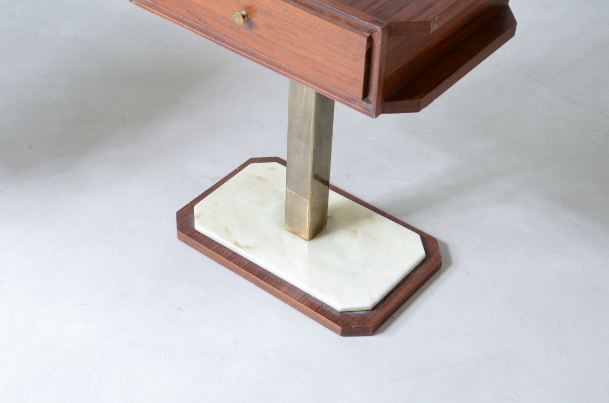 Pair of bedside tables in walnut with marble base and brass column uprights.  Italian manufacture around 1960s.