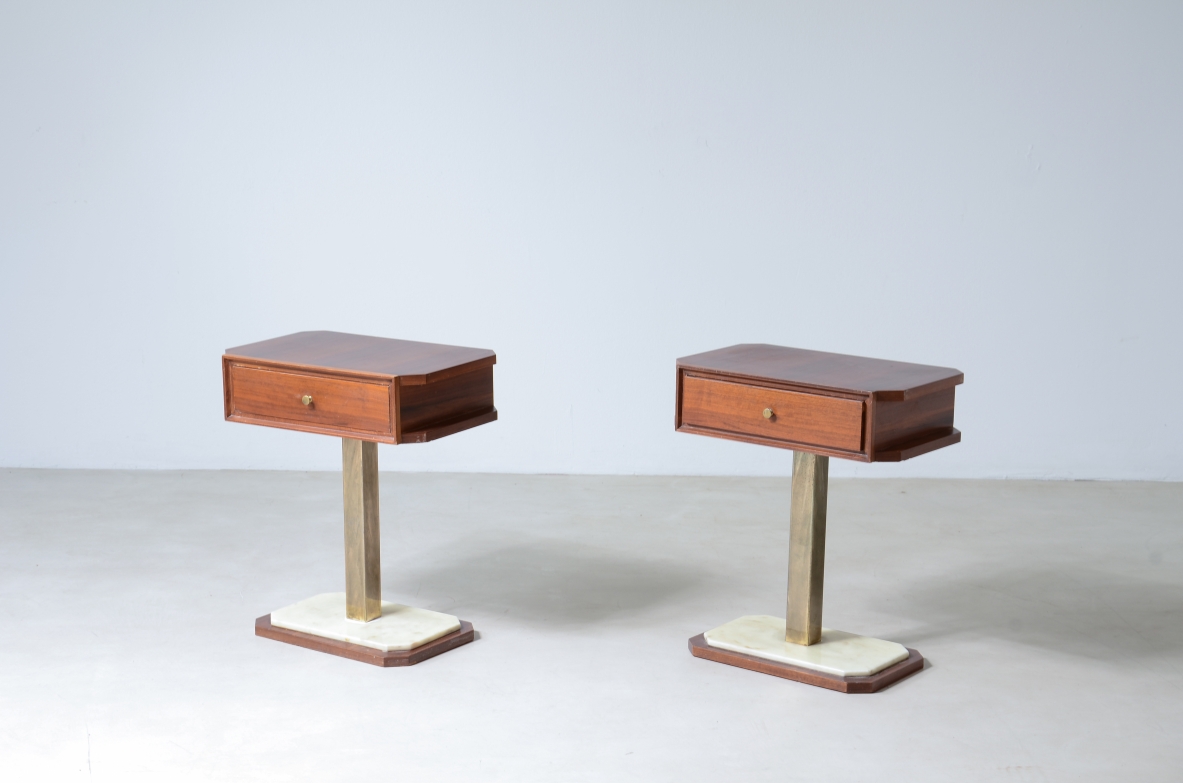 Pair of bedside tables in walnut with marble base and brass column uprights.  Italian manufacture around 1960s.
