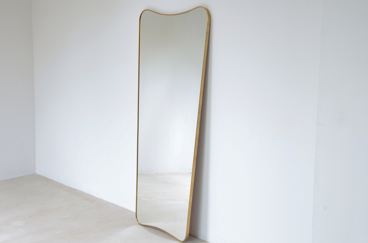 Large mirror with brass frame. This large mirror is custom produced after his original design by Ponti in the 1950's.