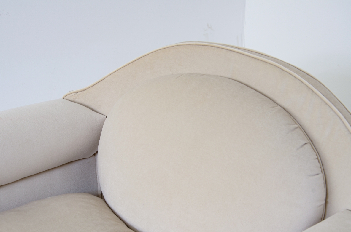 Pair of large organically shaped armchairs with wooden base, covered in cotton velvet.  Italian manufacture from the 1960s