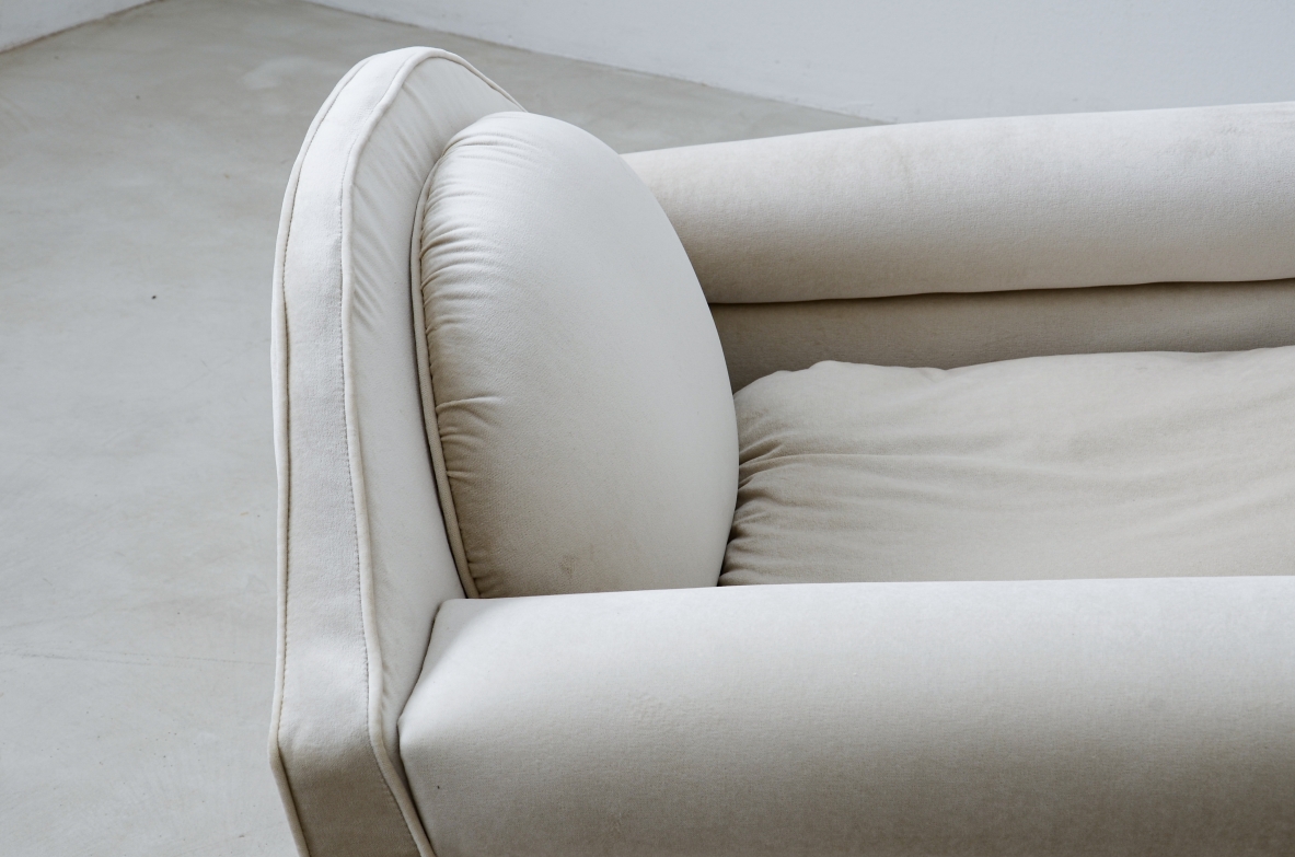 Pair of large organically shaped armchairs with wooden base, covered in cotton velvet.  Italian manufacture from the 1960s