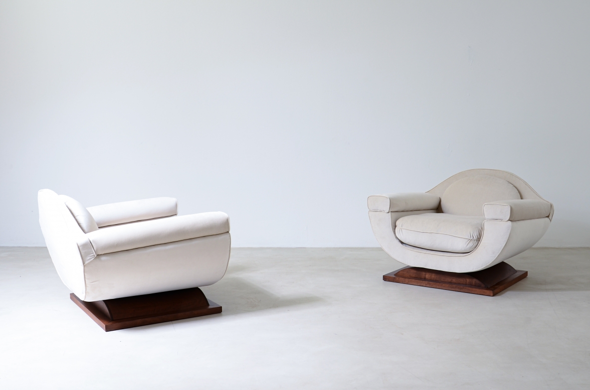 Pair of large organically shaped armchairs with wooden base, covered in cotton velvet.  Italian manufacture from the 1960s