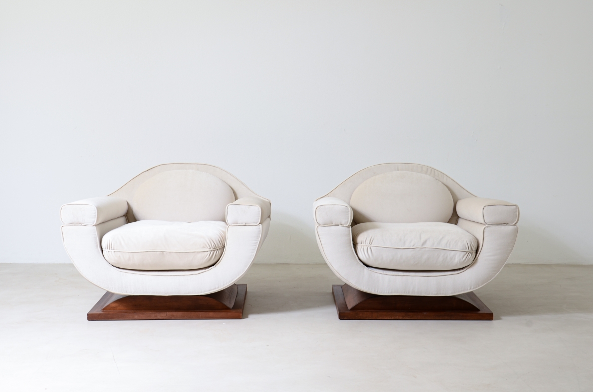 Pair of large organically shaped armchairs with wooden base, covered in cotton velvet.  Italian manufacture from the 1960s