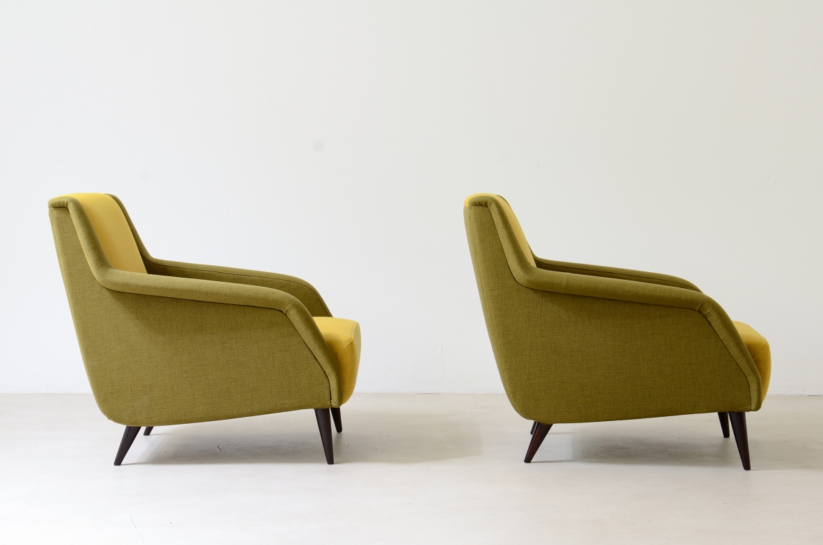 Carlo De Carli, Gio Ponti  Pair of model 802 armchairs covered in padded fabric. Designed in 1954 Cassina manufacture