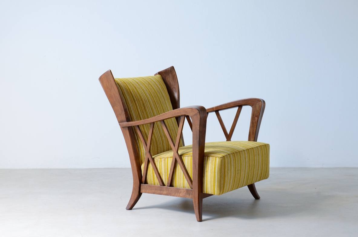 Maurizio Tempestini (1908-1960)  Elegante poltrona in rovere con disegno mosso  1940 ca.