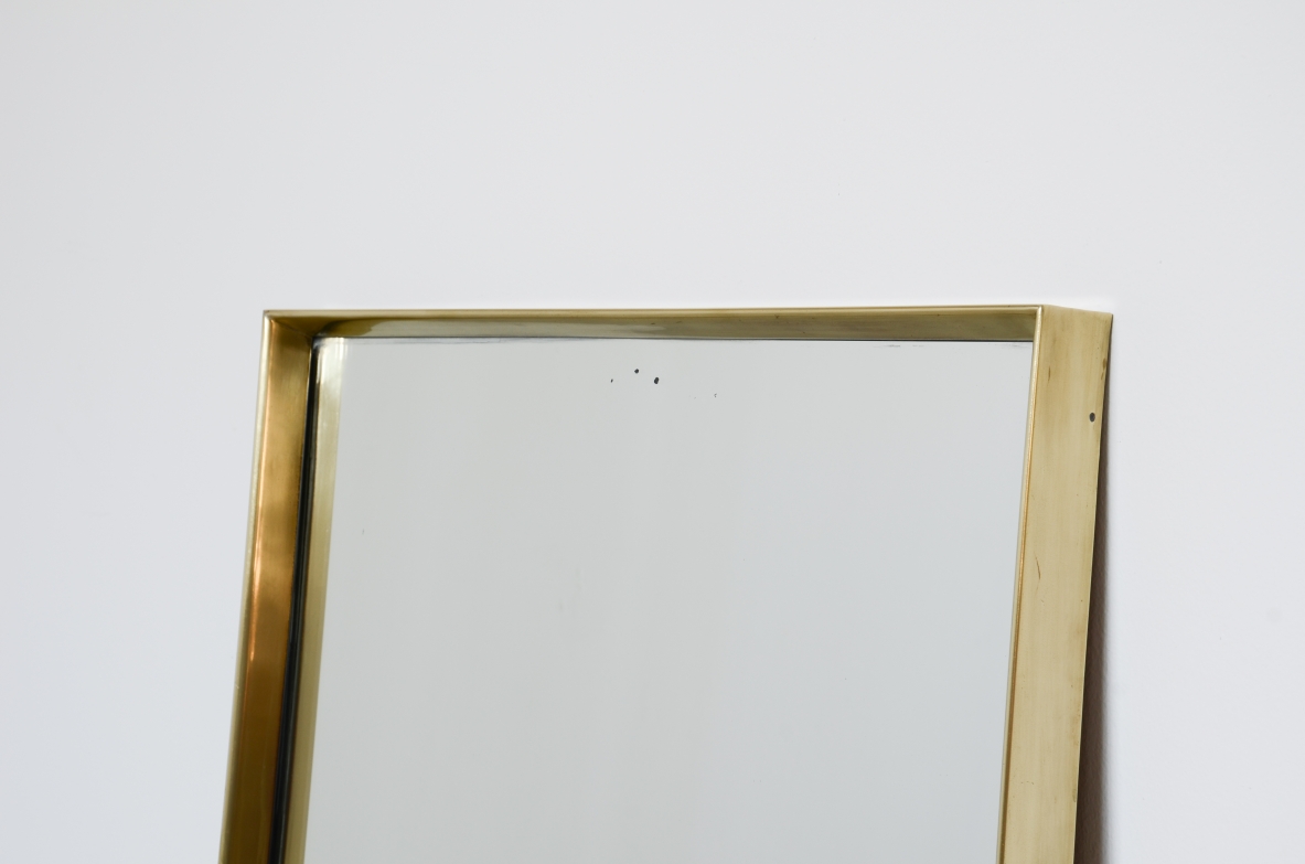 Shaped brass mirror.  Italian manufacture, ca. 1960.