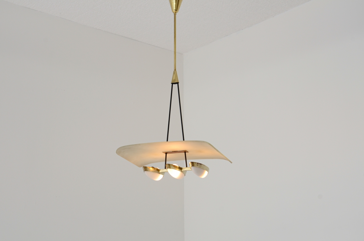 Gilardi Barzaghi metal and brass chandelier with curved metal shade. Manufacture 1950.