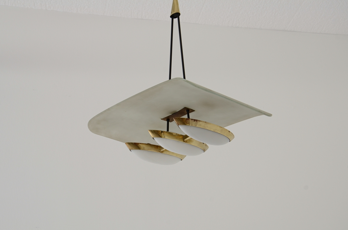 Gilardi Barzaghi metal and brass chandelier with curved metal shade. Manufacture 1950.
