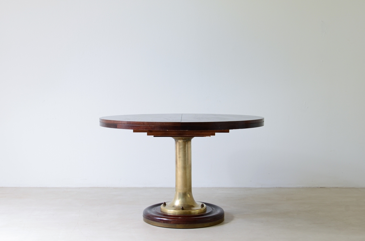 Extendable ship's table with cast bronze column, mahogany base and top. 1960's