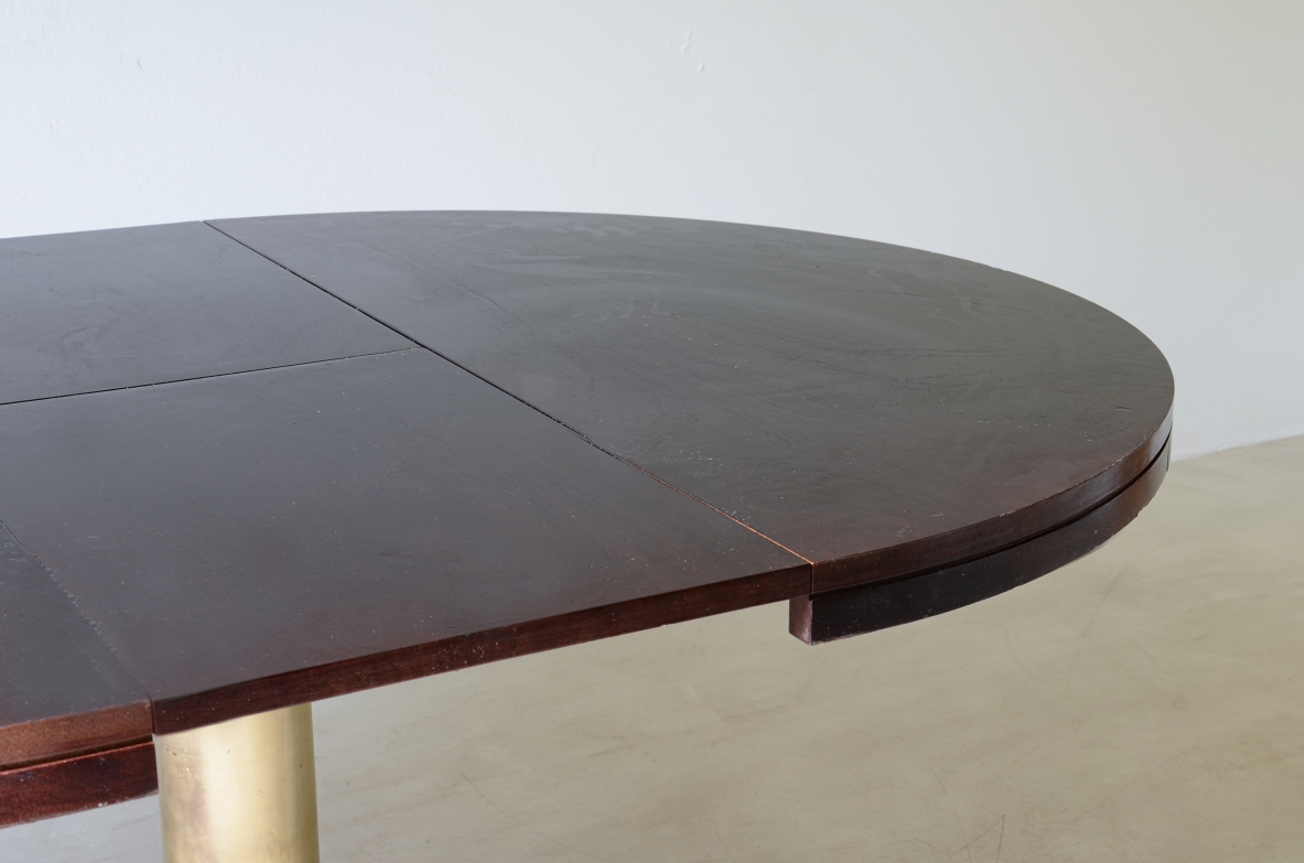 Extendable ship's table with cast bronze column, mahogany base and top. 1960's