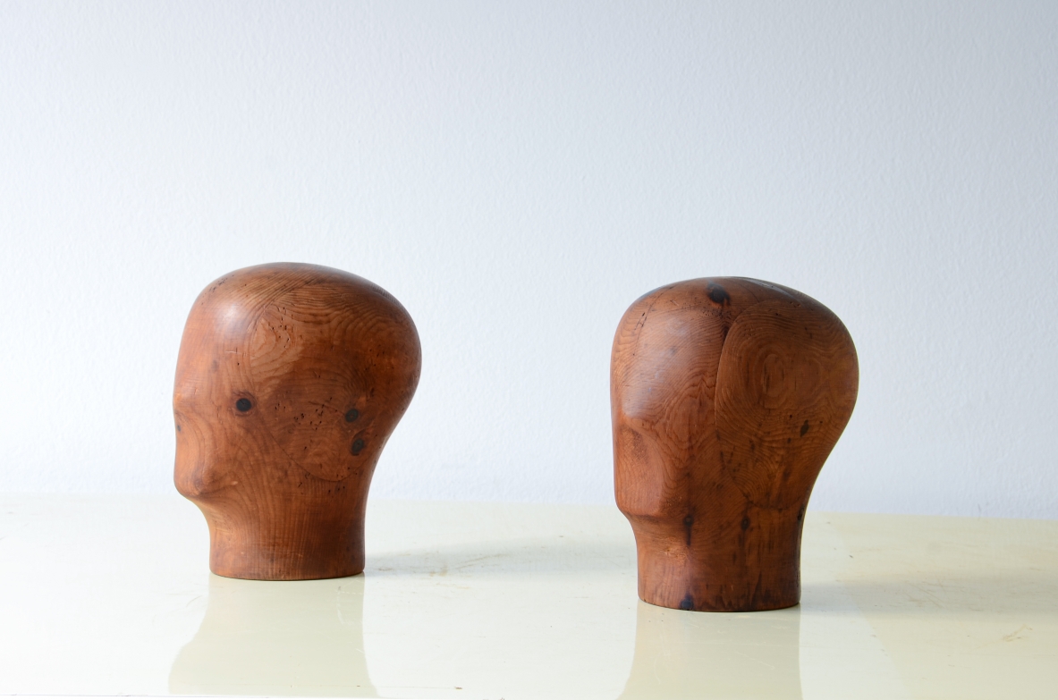 Two heads in turned and carved pine wood.  French manufacture, 1930s.